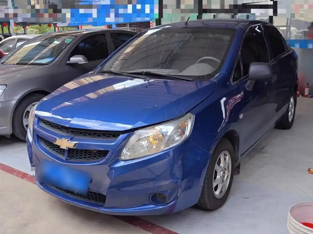 Chevrolet Sail Sail 2010 Sedan 1.2L Manual Warm Edition — photo 1